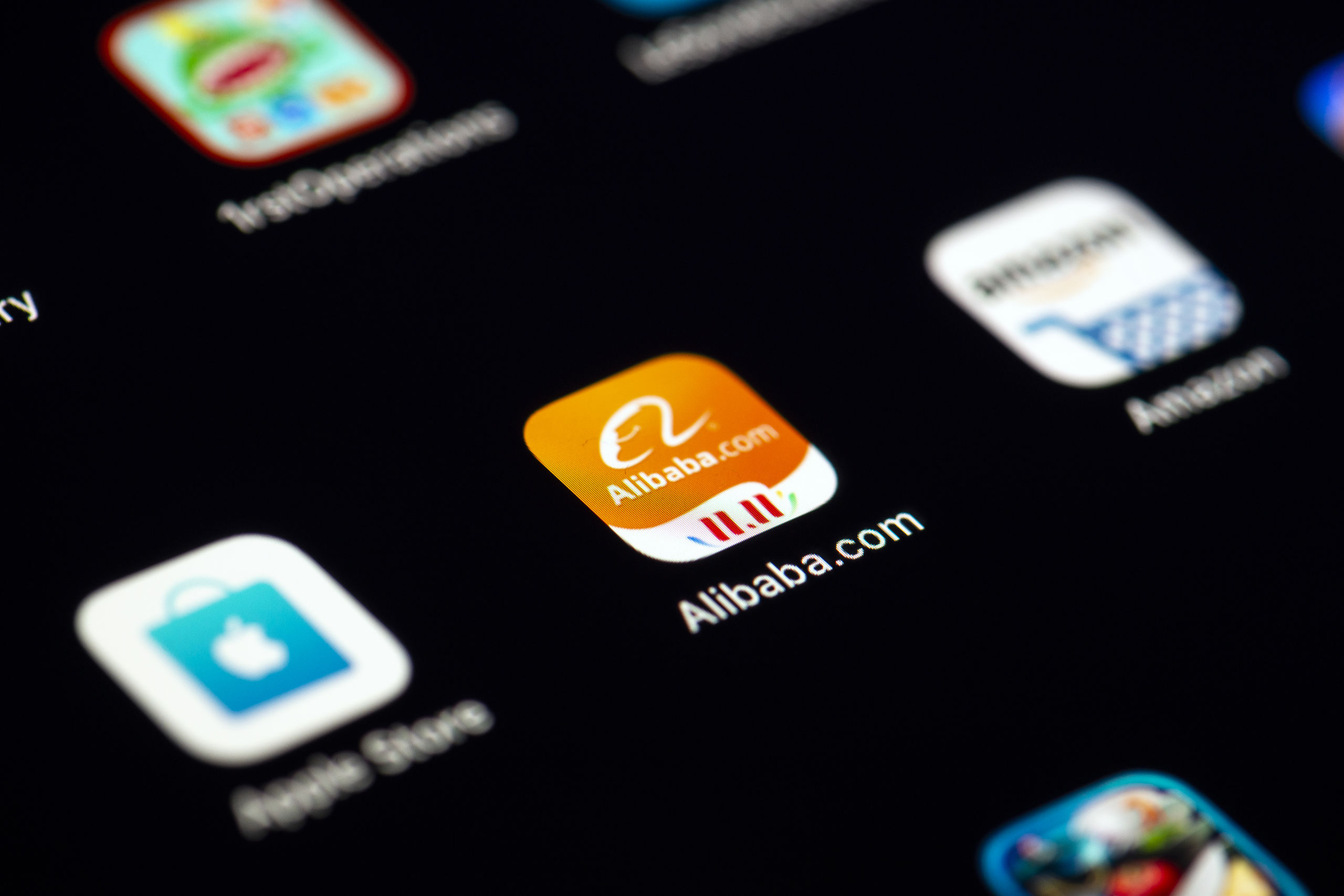 2019-11-15 15:59:05 This picture taken on November 15, 2019 shows the logo of the Chinese multinational e-commerce, retail, internet, and technology conglomerate, Alibaba group app for smartphone in Paris. China's online trading giant Alibaba launched today a colossal stock market operation in Hong Kong. Lionel BONAVENTURE / AFP