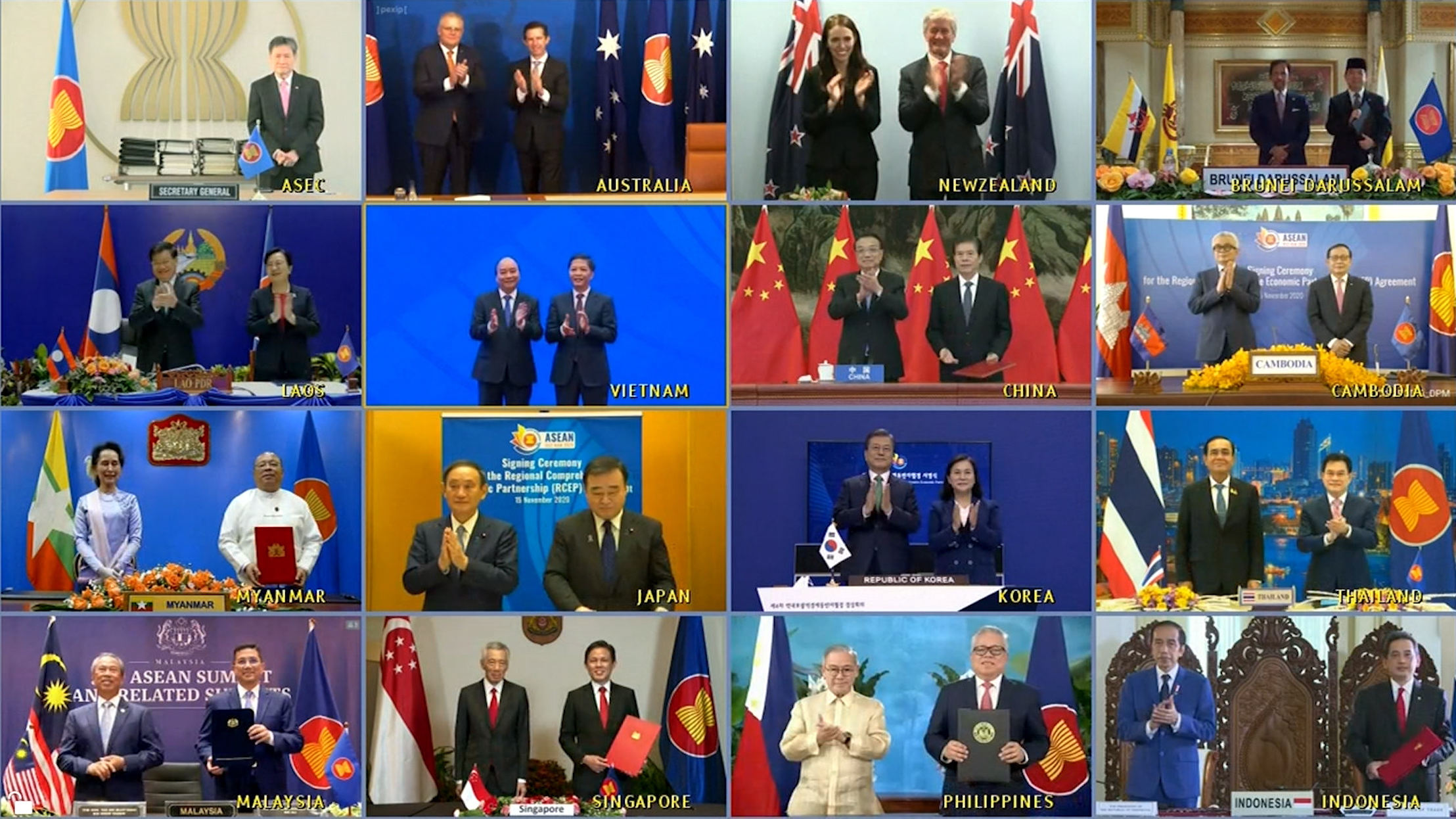 De leiders en handelsministers van de vijftien landen die het RCEP-verdrag hebben ondertekend samen te zien in een videoconferentie afgelopen zondag.