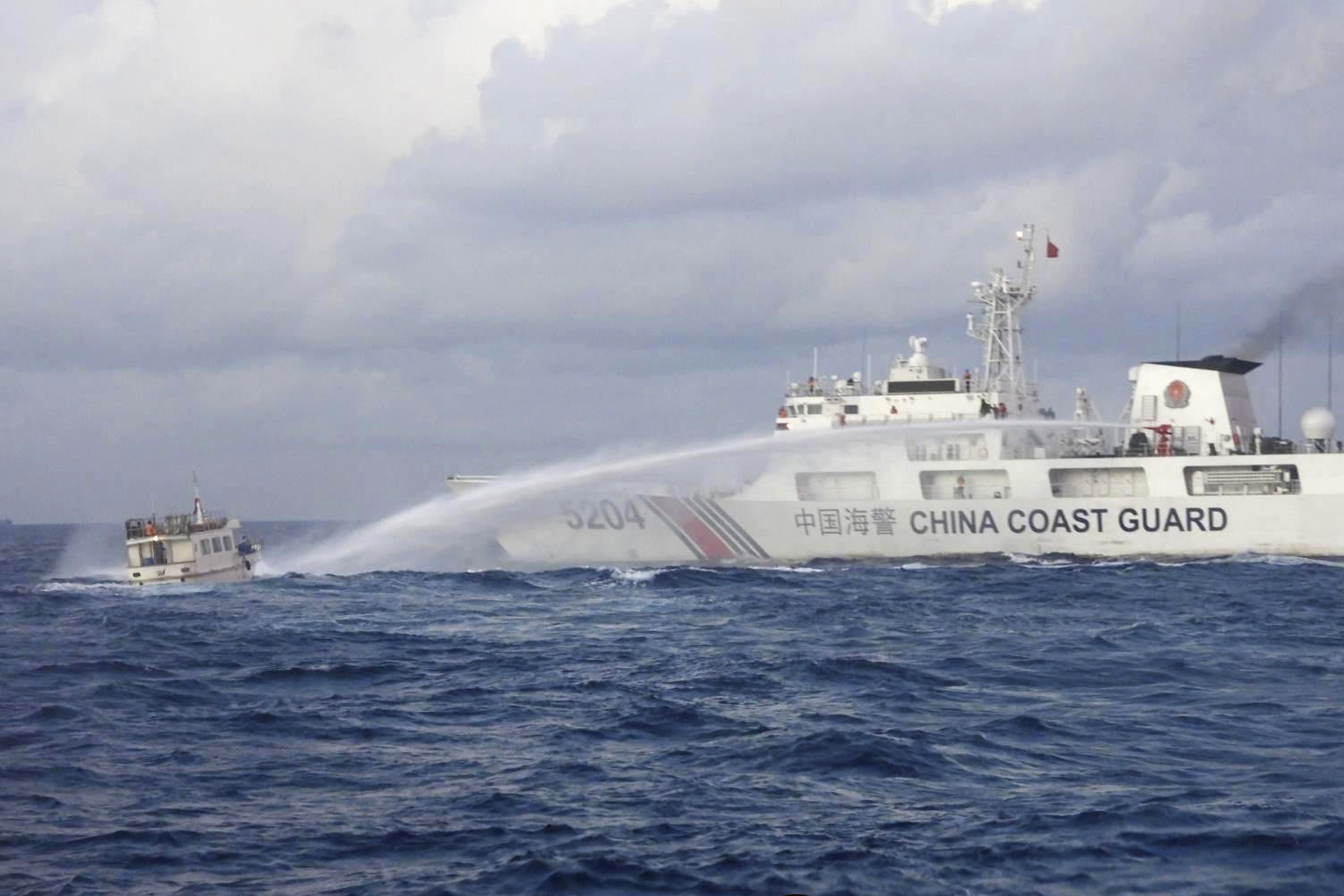 In December, Chinese and Filipino ships clashed in the waters of the South China Sea.  (Australian News Agency/Associated Press)