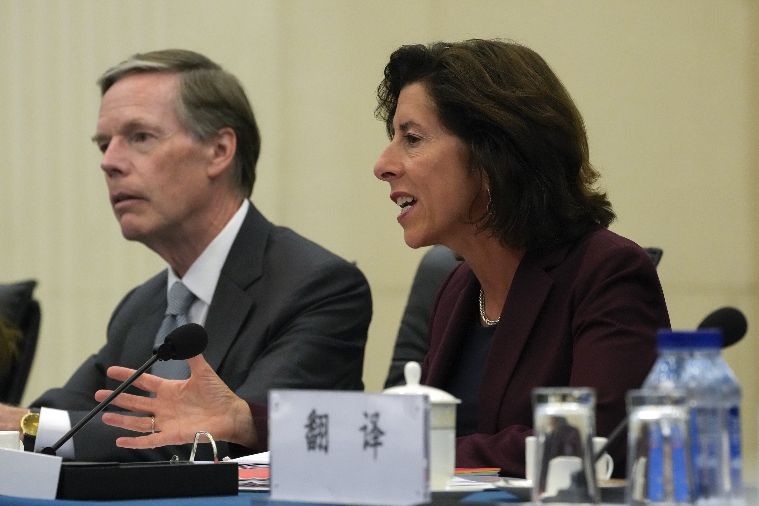 US Secretary of Commerce Gina Raimondo, right, speaks alongside US Ambassador to China Nick Burns during a meeting with Chinese Minister of Commerce Wang Wentao at the Ministry of Commerce in Beijing,