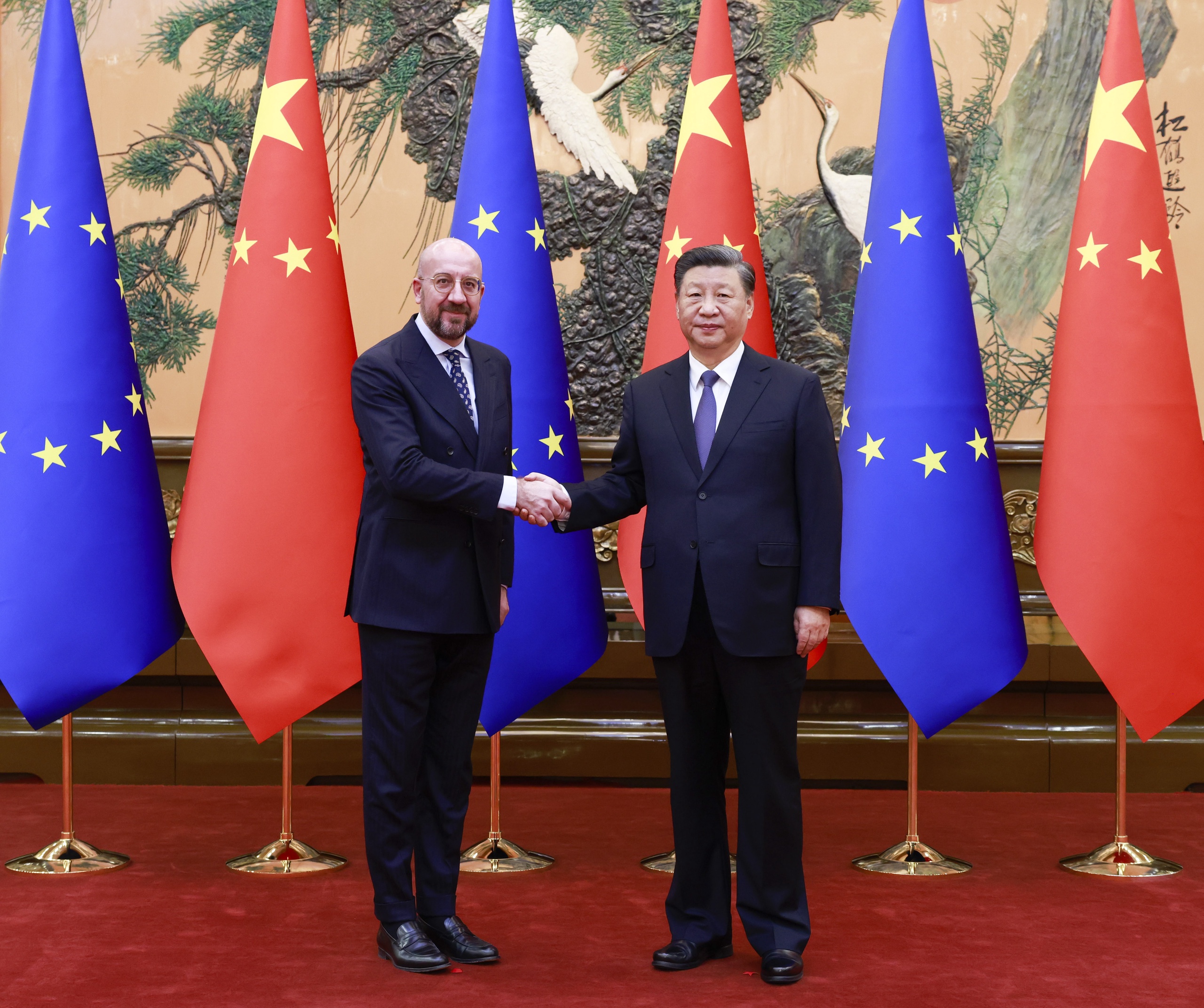epa10341059 Chinese President Xi Jinping (R) shakes hands with President of the European Council Charles Michel (L) during a meeting at the Great Hall of the People in Beijing, China, 01 December 2022.  EPA/XINHUA/DING LIN CHINA OUT / MANDATORY CREDIT  EDITORIAL USE ONLY