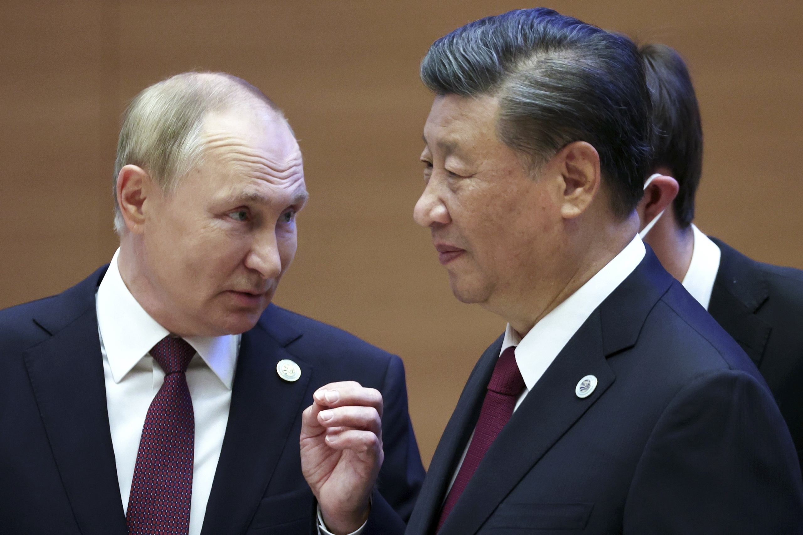 De Russische president Vladimir Poetin met Xi Jinping.