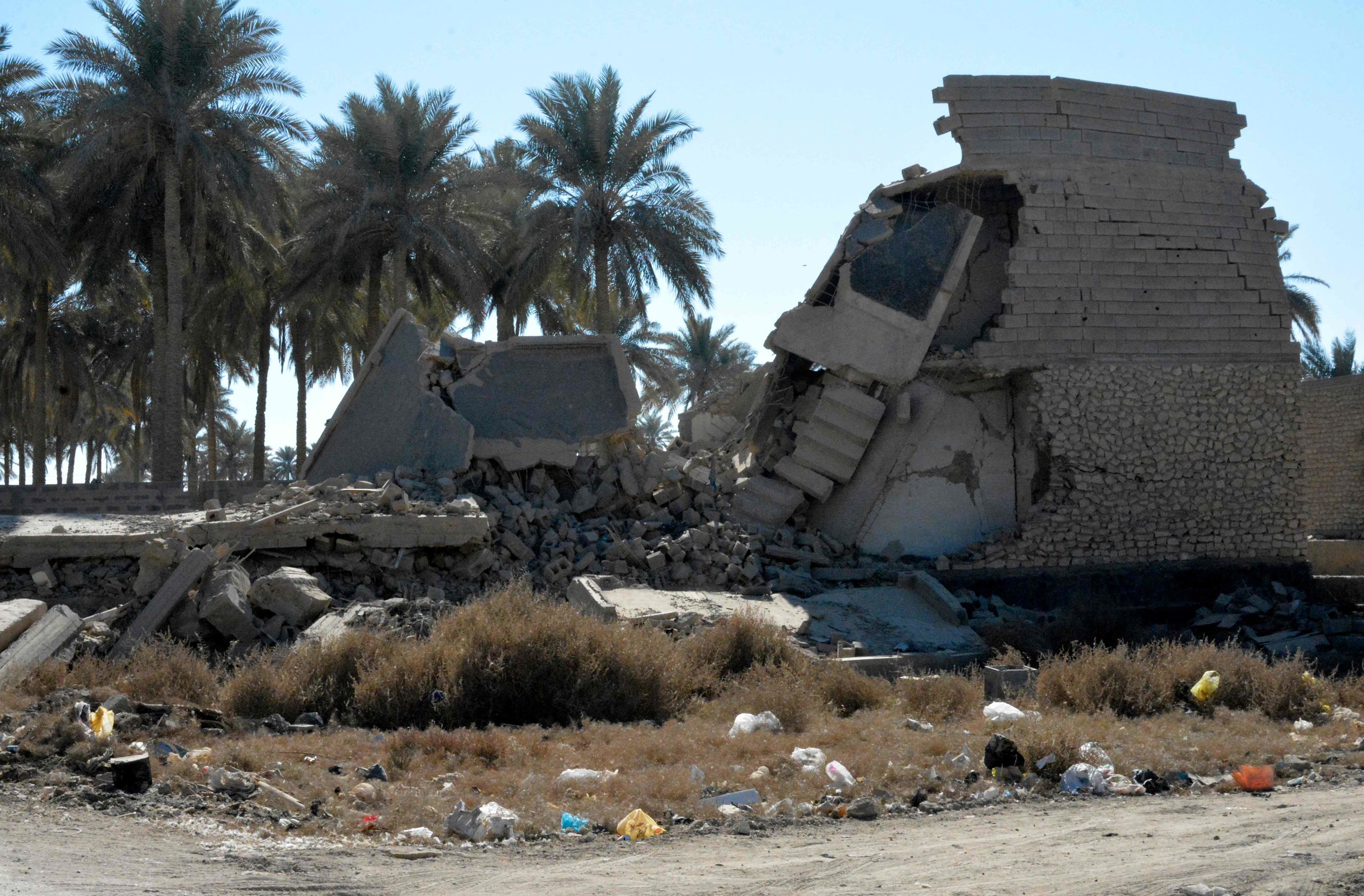 Een kapotgeschoten huis in de Irakese stad Ramadi