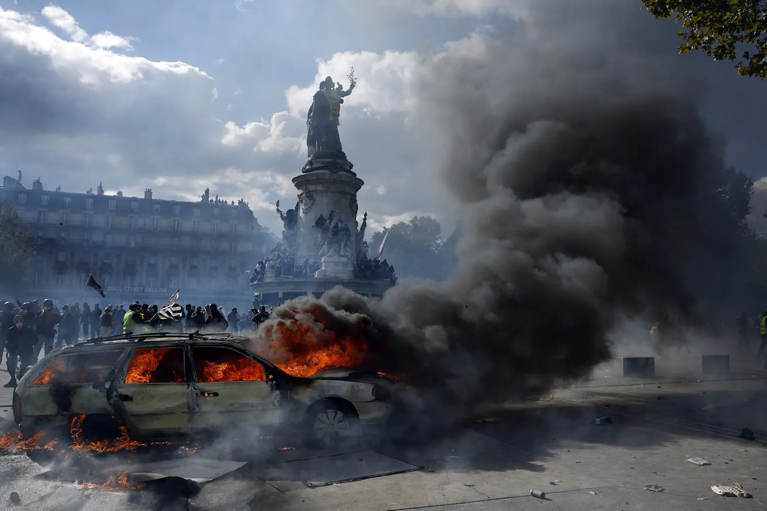 France arrests more than 1,800 after protests turn violent