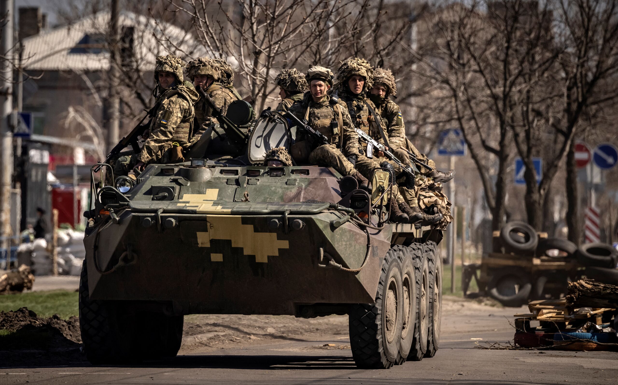 Ukrainian soldiers sit on a armoured military vehicule in the city of Severodonetsk, Donbas region, on April 7, 2022, amid Russia's military invasion launched on Ukraine.