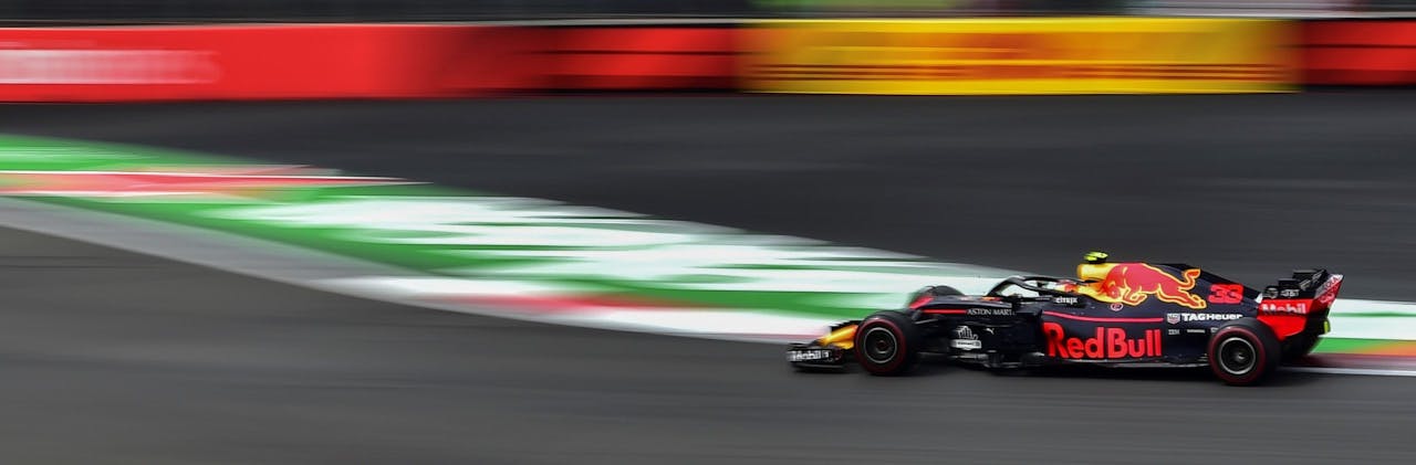 2018-10-28 15:09:08 Red Bull's Dutch driver Max Verstappen powers his car during the F1 Mexico Grand Prix at the Hermanos Rodriguez circuit in Mexico City on October 28, 2018. Lewis Hamilton became only the third Formula One driver in history to capture a fifth world title on Sunday as Max Verstappen won the Mexican Grand Prix. Pedro PARDO / AFP
