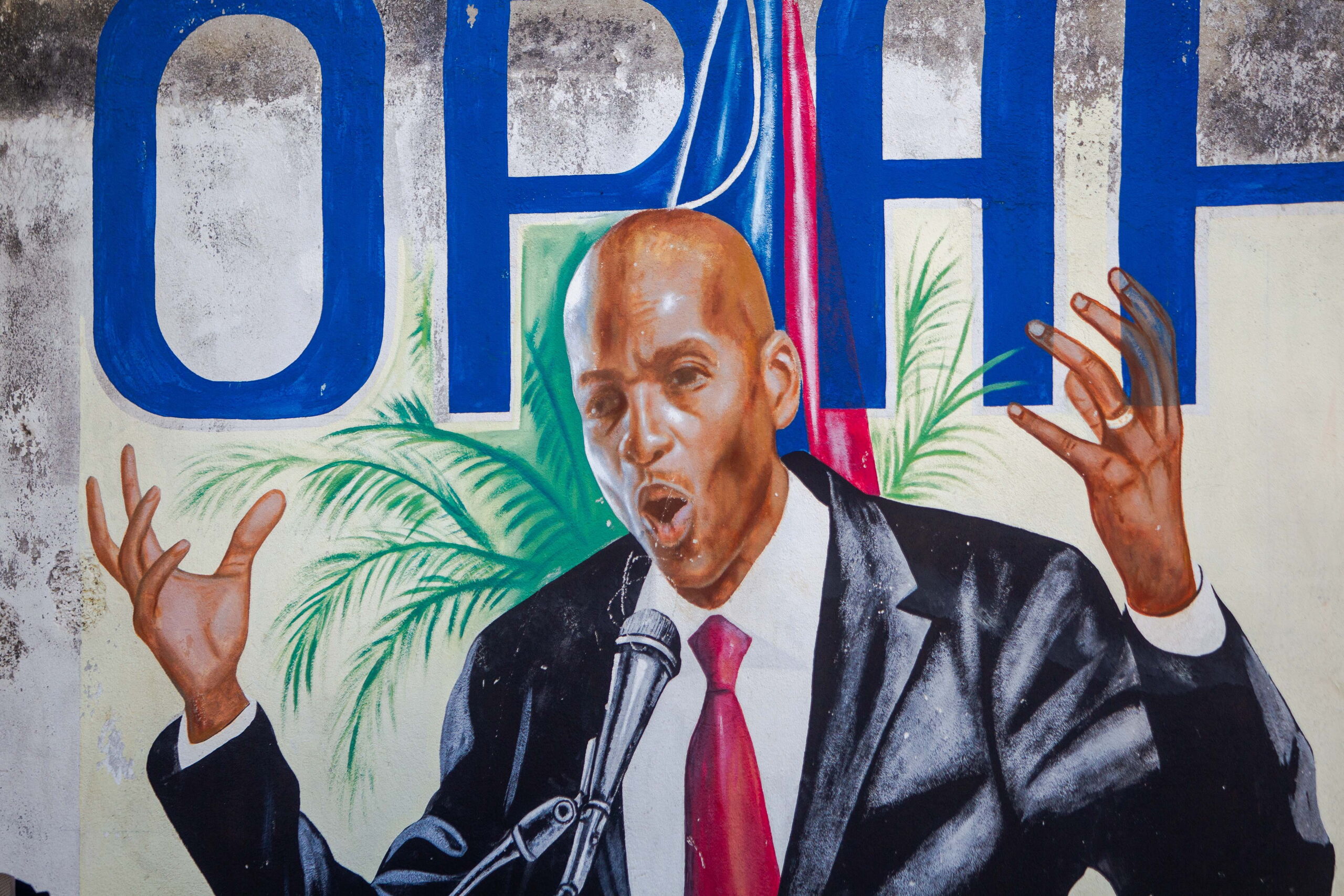Muurschildering van de vermoorde resident Jovenel Moise in Port-au-Prince, Haiti