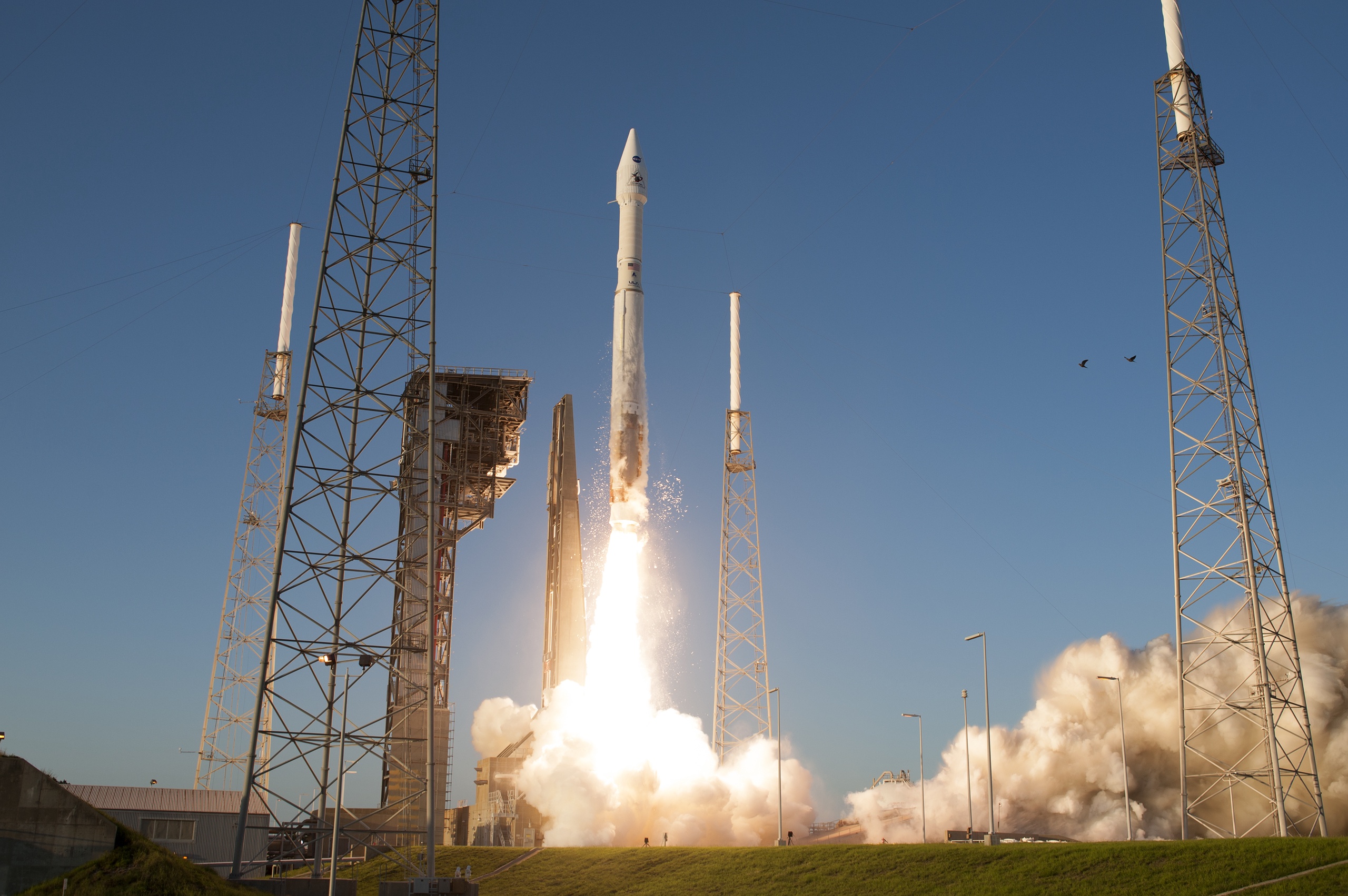 The Atlas V rocket carrying the Osiris-REx spacecraft lifts off from the launch pad at Cape Carnival.