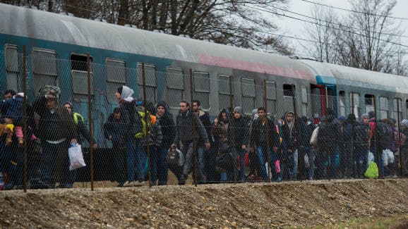 Vluchtelingen in de buurt van de Oostenrijkse grens. Foto: EPA/ANP