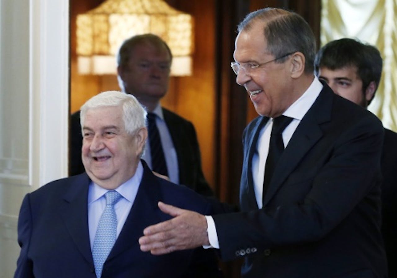 Russische minister van Buitenlandse Zaken Sergei Lavrov (R) en zijn Syrische collega Walid Muallem. EPA