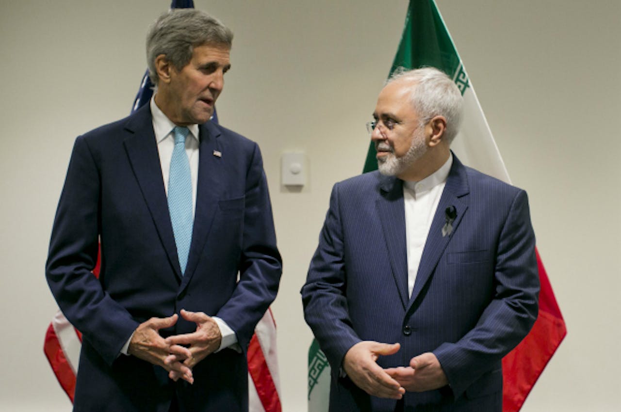 De Amerikaanse minister van Buitenlandse Zaken John Kerry en zijn Iraanse collega Javad Zarif. Foto: ANP
