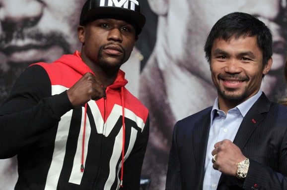 Foto: ANP - Floyd Mayweather Jr. (L) en Manny Pacquiao (R)