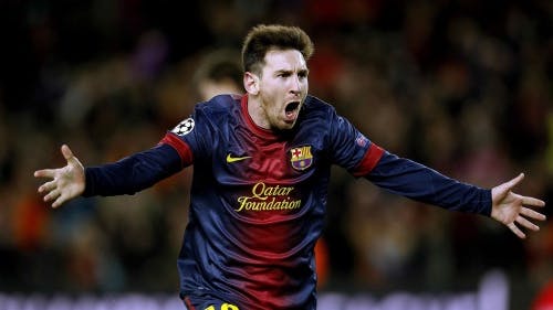 Lionel Messi van FC Barcelona viert zijn tweede goal tegen AC Milan. EPA