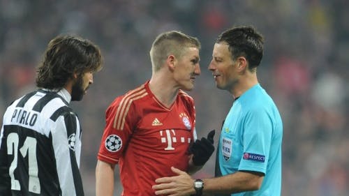 Mark Clattenburg (R).EPA