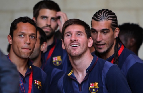 Lionel Messi (C) van FC Barcelona en ploeggenoten in de Westelijke Jordaanoever, EPA