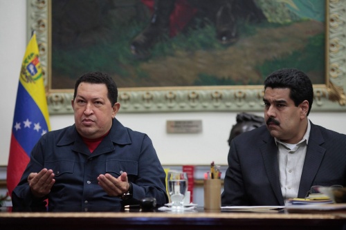 President ChÃ¡vez (L) en vicepresident Maduro (R). EPA