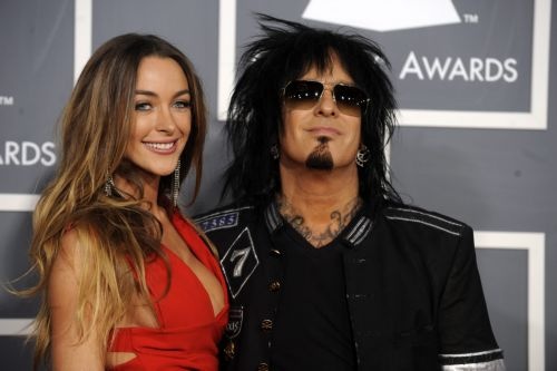Nikki Sixx met zijn verloofde Courtney Bingham. EPA
