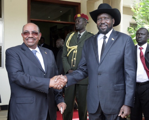 Omar Hassan al-Bashir (L), EPA