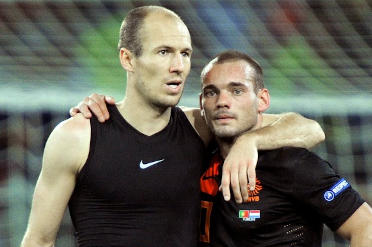 Arjen Robben en Wesley Sneijder na het verlies tegen Portugal.