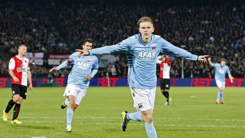 Aron Jóhannsson van AZ juicht nadat hij de 2-2 heeft gescoord uit een penalty tegen Feyenoord. ANP PRO SHOTS