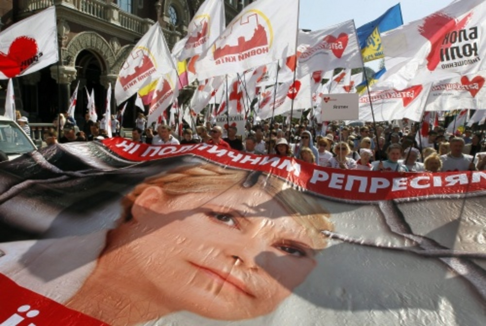 Protesten in Kiev tegen het gevangenschap van oud-premier Timosjenko. EPA