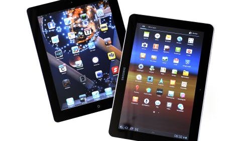 Samsung Galaxy tablet (r) en de Apple Ipad. ANP