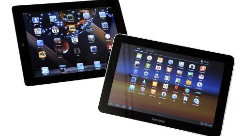 Samsung Galaxy tablet (r) en de Apple Ipad. ANP