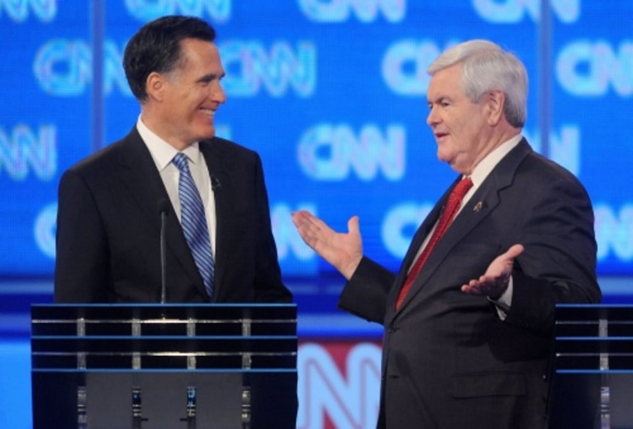 Mitt Romney (links) and Newt Gingrich. ANP.