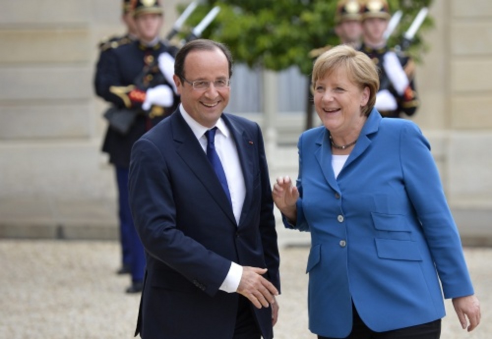 François Hollande en Angela Merkel. EPA