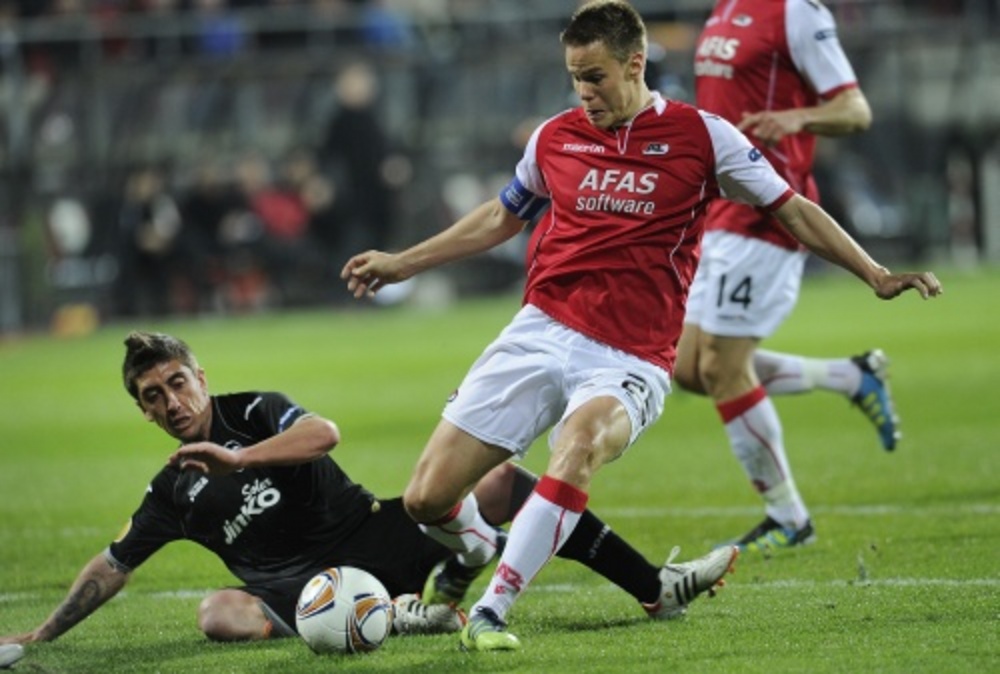 Niklas Moisander (R). ANP