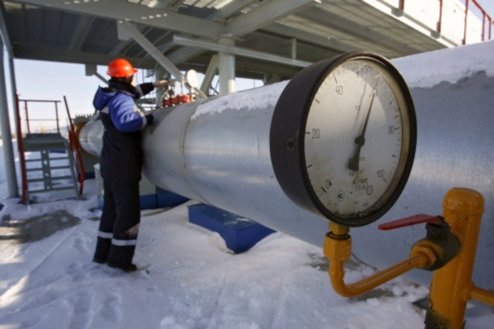 Een medewerker van Gazprom. EPA