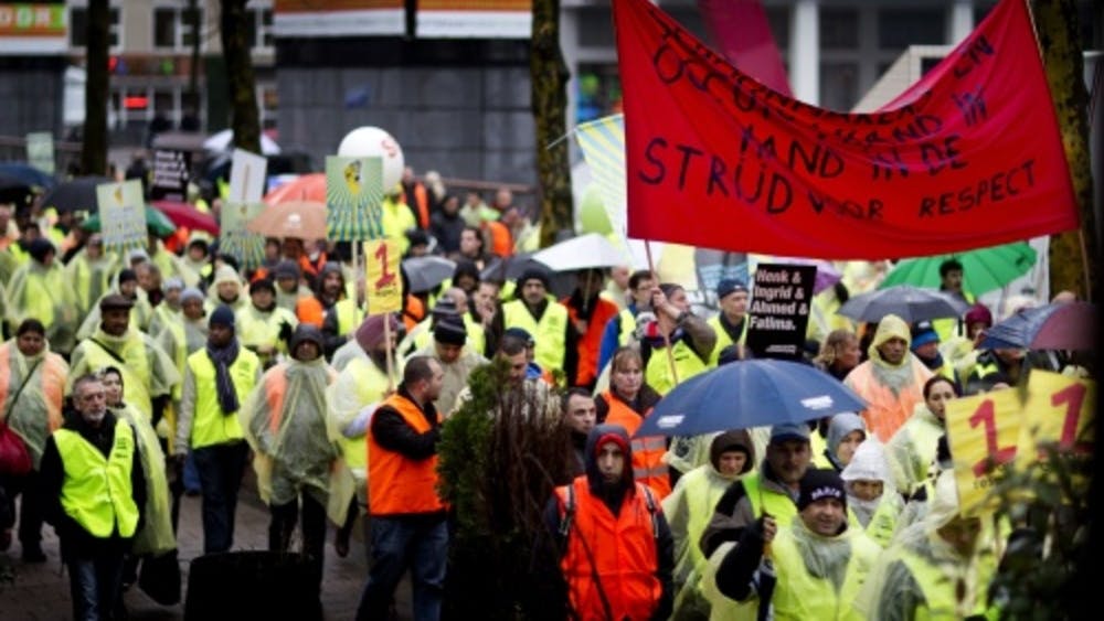 Schoonmakers tijdens een eerdere protestactie in Rotterdam. ANP