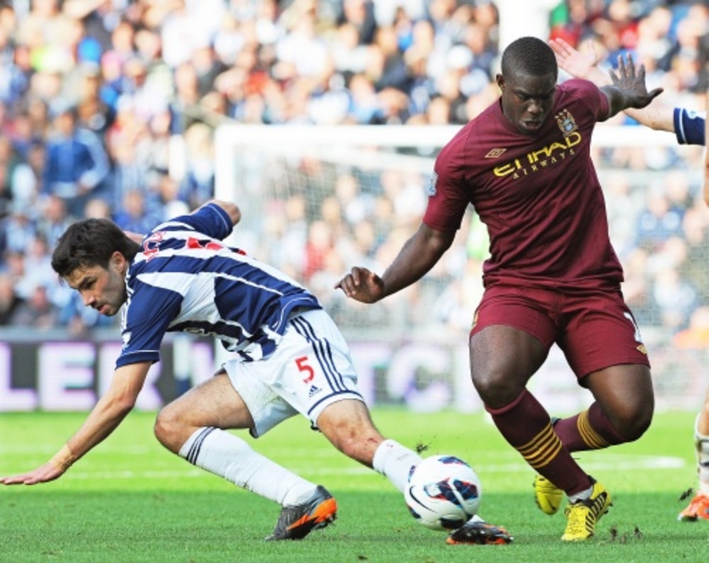 Micah Richards (R). EPA