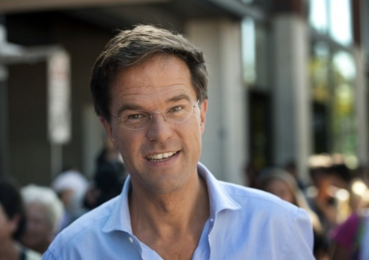 Blijdschap bij Uri Rosenthal en Fred Teeven van de VVD bij het horen van de uitslag van de eerste exitpoll. ANP