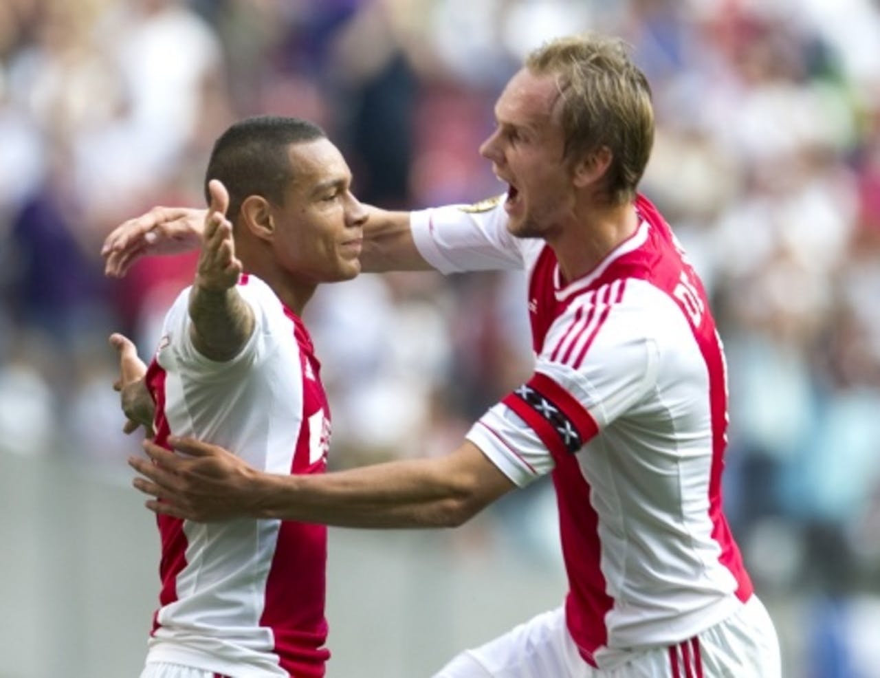 Vreugde bij Gregory van der Wiel (L) en Siem de Jong (R) van Ajax na de 1-0 tegen AZ. ANP
