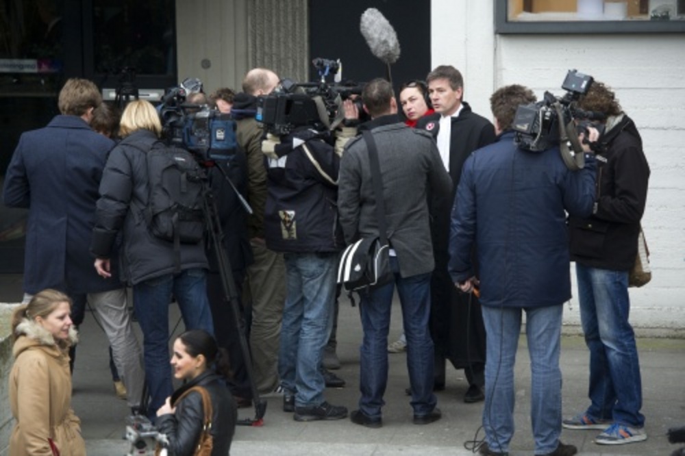 Tjalling van der Goot, advocaat van verdachte Robert M. staat de pers te woord bij de rechtbank in Amsterdam. ANP