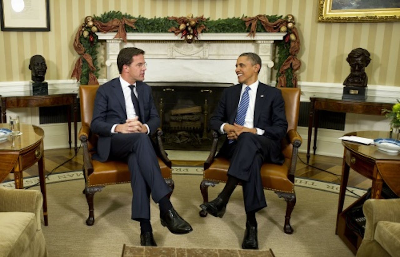 Premier Mark Rutte (L) op bezoek bij de Amerikaanse president Barack Obama (R). ANP