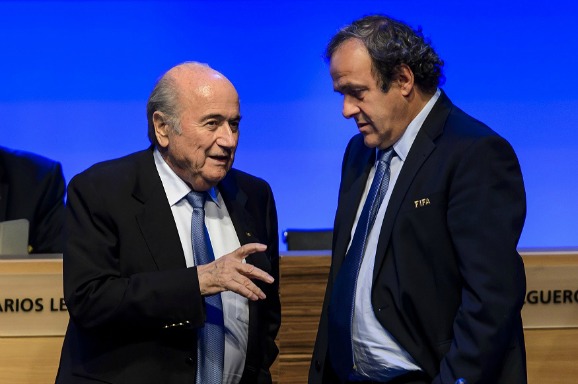 Blatter (L) en Platini (R) tijdens het FIFA congres in SÃ£o Paulo in 2014. Foto: ANP/AFP