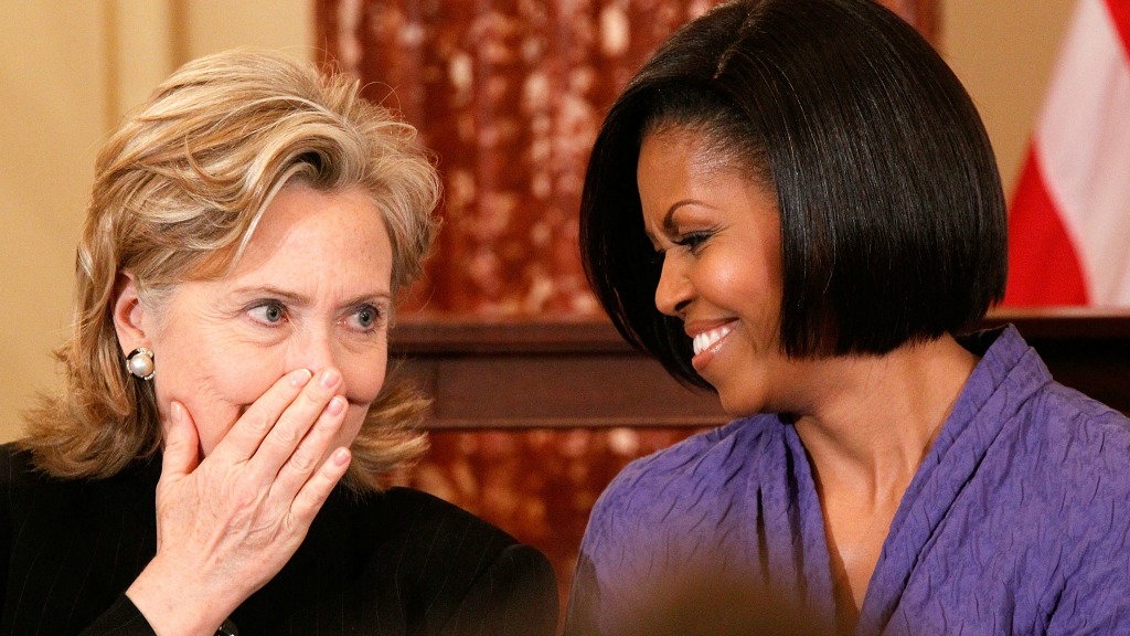 Hillary Clinton met Michelle Obama. Foto: ANP
