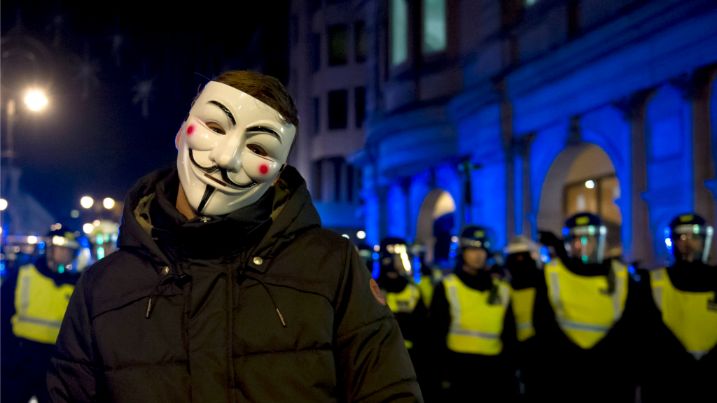 Anonieme demonstrant in Londen, afgelopen november (Foto: Hollandse Hoogte)