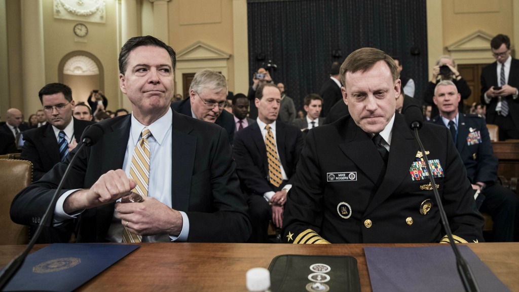  FBI-directeur James Comey (links) en NSA-baas Michael Rogers. Foto: ANP. 