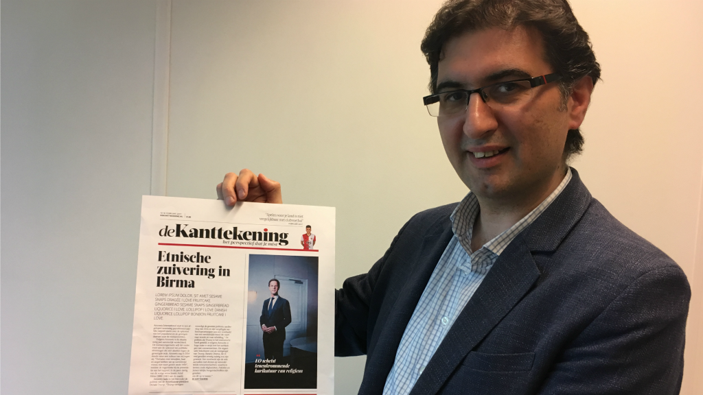 Voormalig Zaman Vandaag-hoofdredacteur Mehmet Cerit met de nieuwe krant 'De Kanttekening'. Foto BNR / Harmen van der Veen