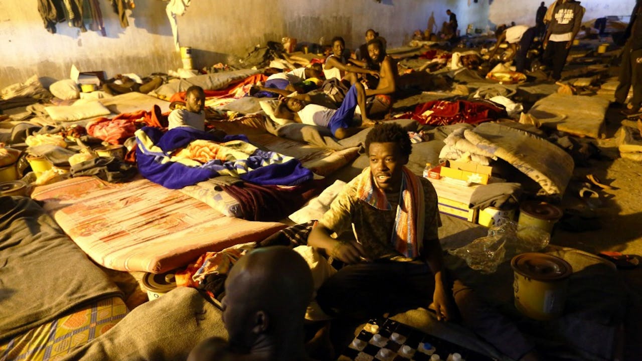 Opvang-/detentiecentrum voor migranten in de Libische hoofdstad Tripoli. Foto: ANP/AFP