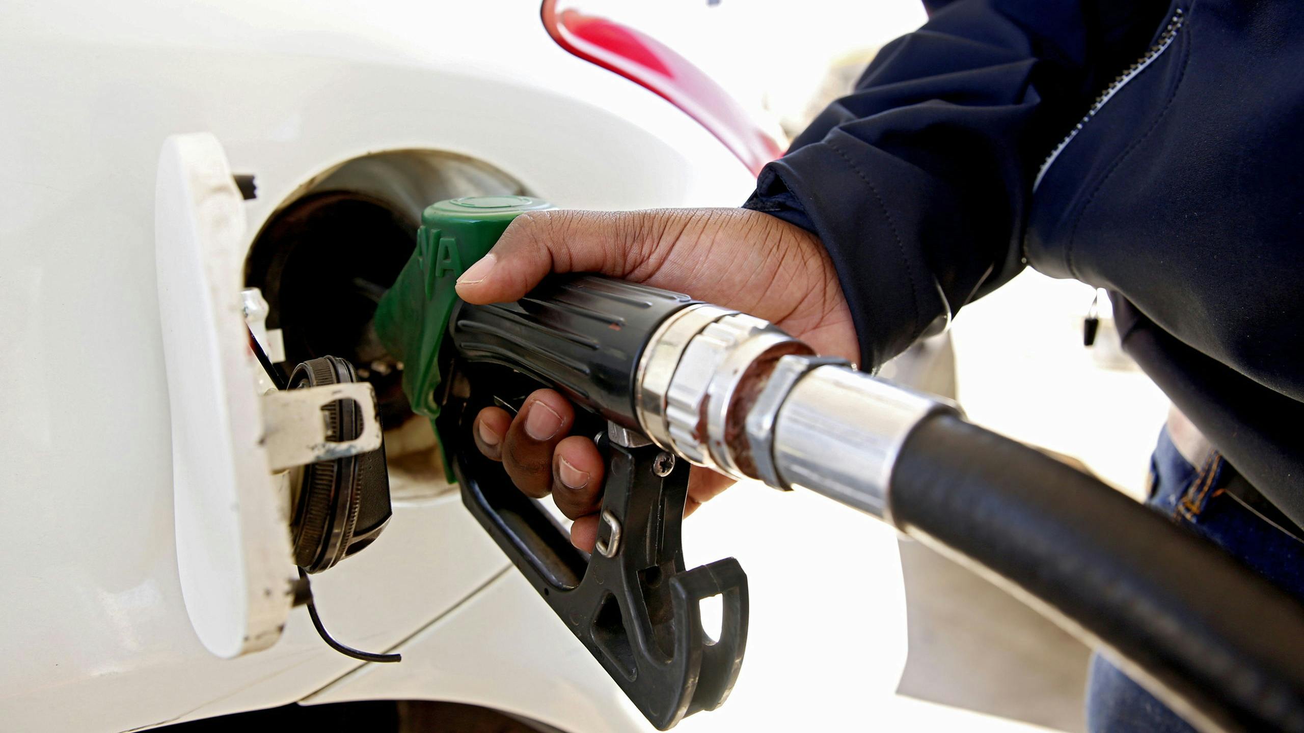2019-06-12 10:51:03 epa07643596 A customer fuels up his vehicle at a service station in Harare, Zimbabwe, 12 June 2019. Zimbabwe Energy Regulatory Authority (Zera) has marginally increased the price of petrol and diesel respectively, with immediate effect as the local currency continues to plunge against the United States dollar.The retail price of blend petrol is now 5.26 Zimbabwean dollars per liter, up from ZWL 4.97 and diesel will sell at ZWL 5.07 from ZWL 4.89 per Liter The price for ethanol is now ZWL 4.60 per litre. This is the third fuel increase in six months.  EPA/AARON UFUMELI