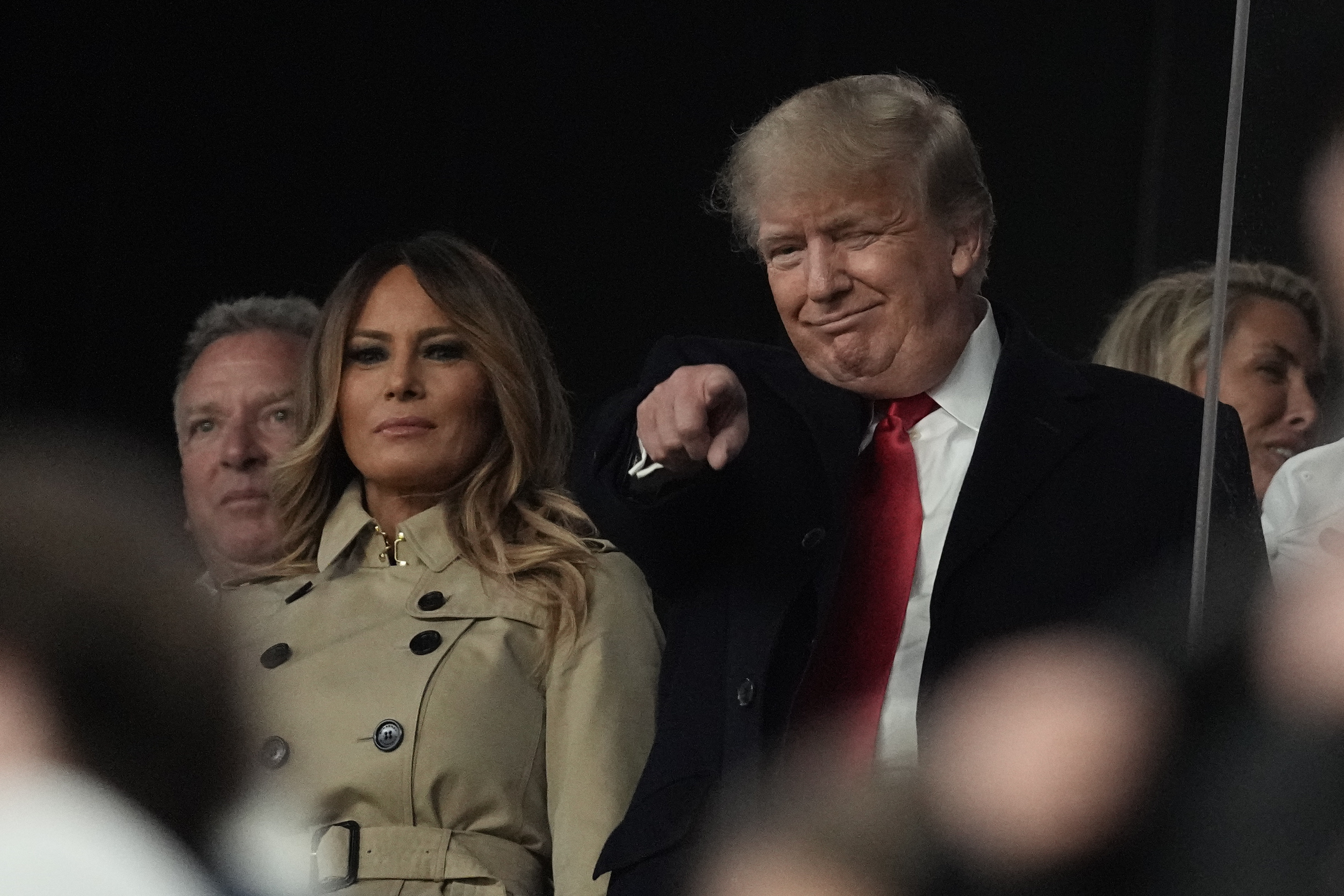 Voormalig president Donald Trump met zijn vrouw Melania Trump tijdens een baseballwedstrijd in Atlanta. 
