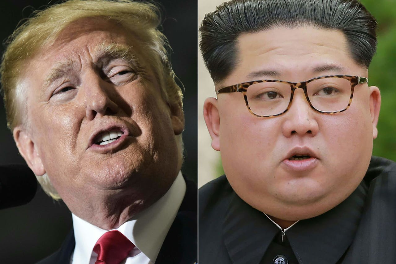 2018-05-10 14:59:41 (COMBO) This combination of file pictures created on May 10, 2018 shows US President Donald Trump during a rally at Total Sports Park in Washington, Michigan on April 28, 2018, and a photo released from North Korea's official Korean Central News Agency (KCNA) on April 21, 2018 of North Korean leader Kim Jong-Un delivering a speech while attending the Third Plenary Meeting of the Seventh Central Committee of the Workers' Party of Korea in Pyongyang. US President Donald Trump on May 10, 2018 announced his historic summit with North Korean leader Kim Jong Un will take place in Singapore on June 12. "We will both try to make it a very special moment for World Peace!" Trump said in a tweeted announcement.The location was revealed hours after three American prisoners were released by North Korea and arrived back in the United States. / AFP PHOTO / AFP PHOTO AND KCNA VIA KNS / Mandel Ngan AND - / - South Korea OUT / REPUBLIC OF KOREA OUT ---EDITORS NOTE--- RESTRICTED TO EDITORIAL USE - MANDATORY CREDIT "AFP PHOTO/KCNA VIA KNS" - NO MARKETING NO ADVERTISING CAMPAIGNS - DISTRIBUTED AS A SERVICE TO CLIENTS THIS PICTURE WAS MADE AVAILABLE BY A THIRD PARTY. AFP CAN NOT INDEPENDENTLY VERIFY THE AUTHENTICITY, LOCATION, DATE AND CONTENT OF THIS IMAGE. THIS PHOTO IS DISTRIBUTED EXACTLY AS RECEIVED BY AFP. /