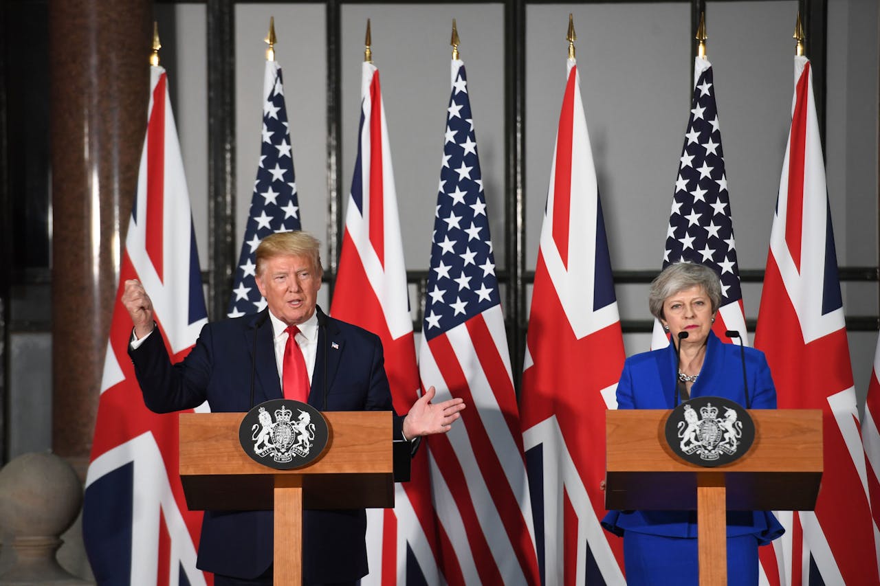 US President Donald Trump (L) speaks as Britain's Prime Minister Theresa May (R) listens during a joint press conference at the Foreign and Commonwealth Office (FCO) in central London on June 4, 2019, on the second day of the US president's three-day State Visit to the UK. - US President Donald Trump turns from pomp and ceremony to politics and business on Tuesday as he meets Prime Minister Theresa May on the second day of a state visit expected to be accompanied by mass protests. (Photo by Stefan Rousseau / POOL / AFP)