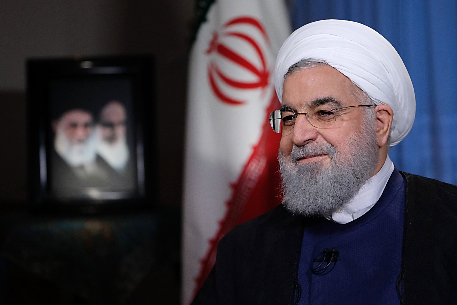 A handout picture provided by the Iranian presidency on August 6, 2018 shows President Hassan Rouhani giving an interview to the Iranian TV in Tehran. President Hassan Rouhani said the US had launched "psychological warfare" against Iran, in a televised speech Monday on the eve of renewed sanctions. "They want to launch psychological warfare against the Iranian nation and create divisions among the people," he said. / AFP PHOTO / Iranian Presidency / - / === RESTRICTED TO EDITORIAL USE - MANDATORY CREDIT "AFP PHOTO / HO / IRANIAN PRESIDENCY" - NO MARKETING NO ADVERTISING CAMPAIGNS - DISTRIBUTED AS A SERVICE TO CLIENTS ===