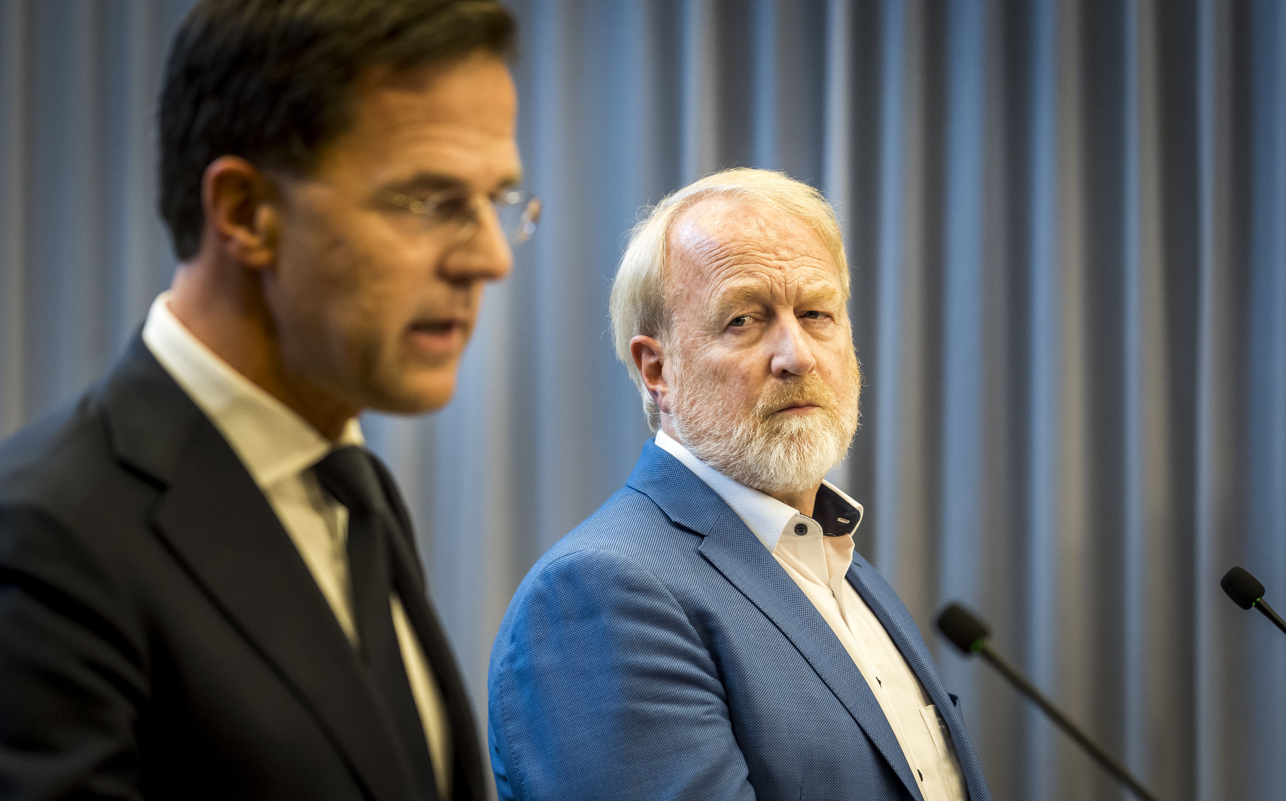 Premier Mark Rutte en Jaap van Dissel (RIVM). 